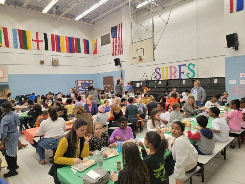 Students Eating at the Feast